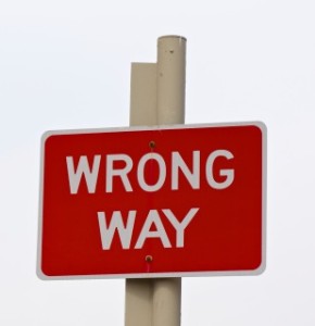 Wrong way sign post